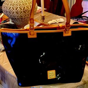 Dooney and Bourke black patient leather tote  used 2 times  excellent condition